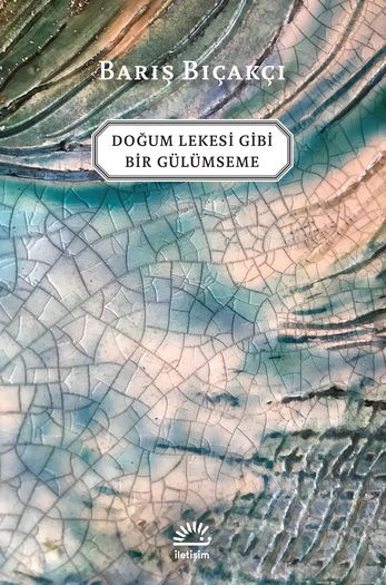 Doğum Lekesi Gibi Bir Gülümseme‎