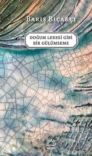 Doğum Lekesi Gibi Bir Gülümseme‎